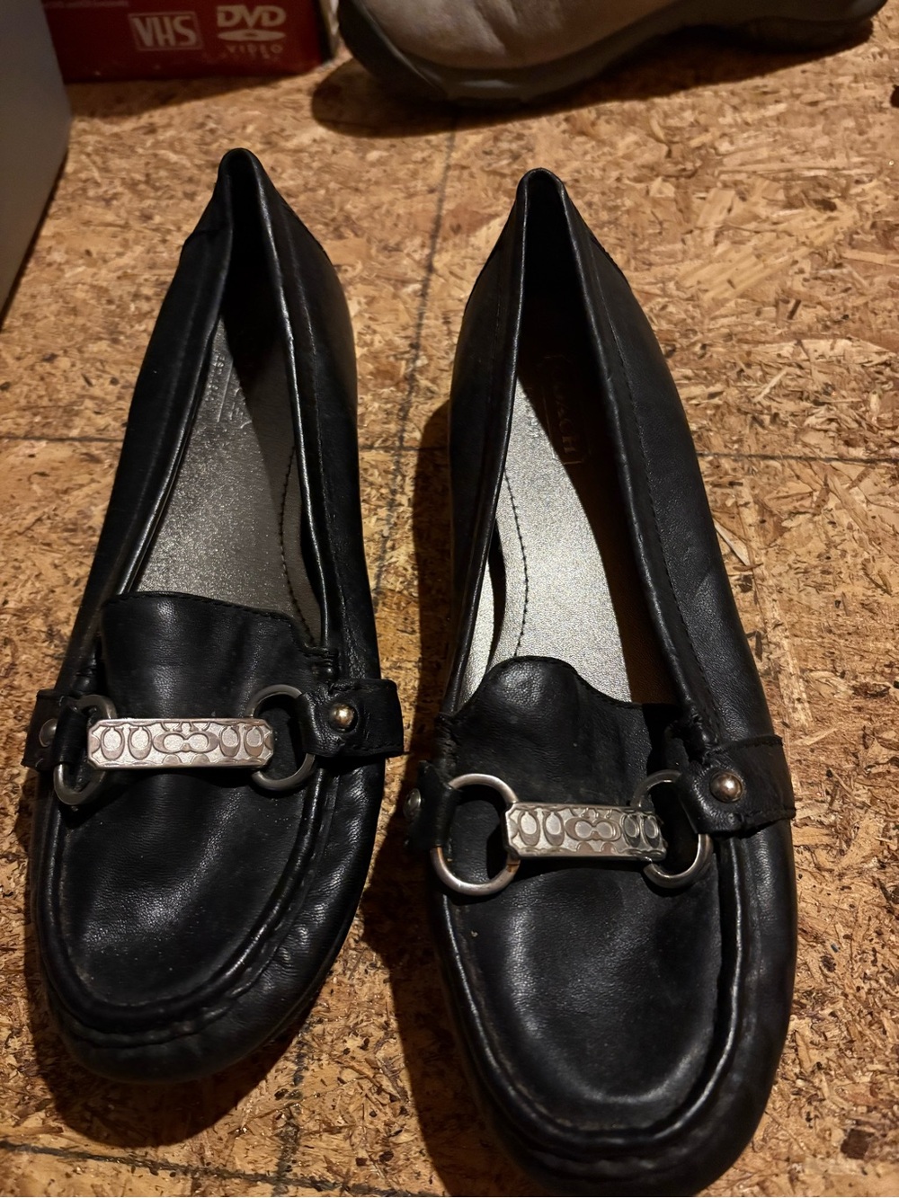 Coach Black Leather Women's Slip-On Loafers with Silver Hardware